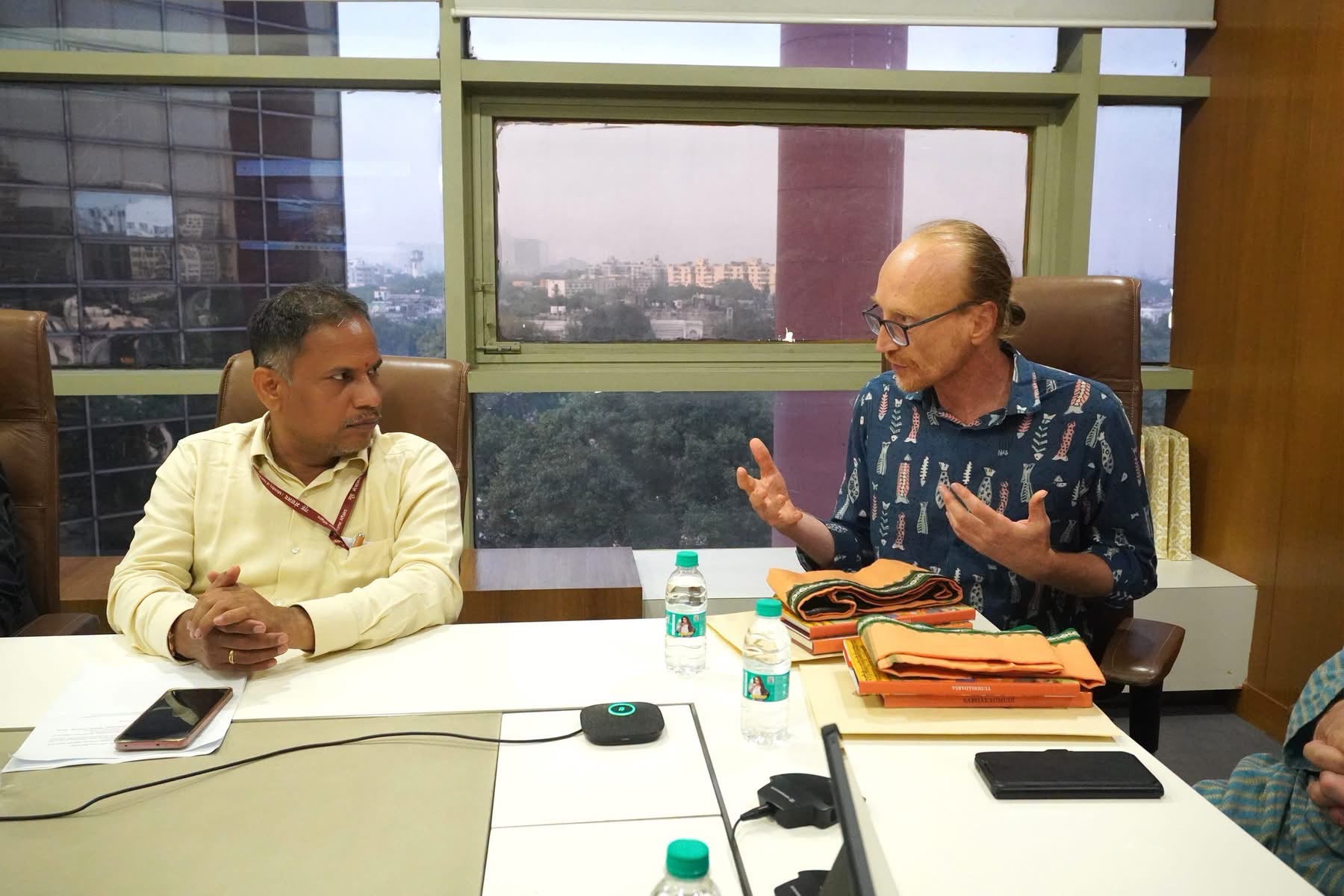 Jason Birch speaking at the round table; Dr Anirban Dash on the left.