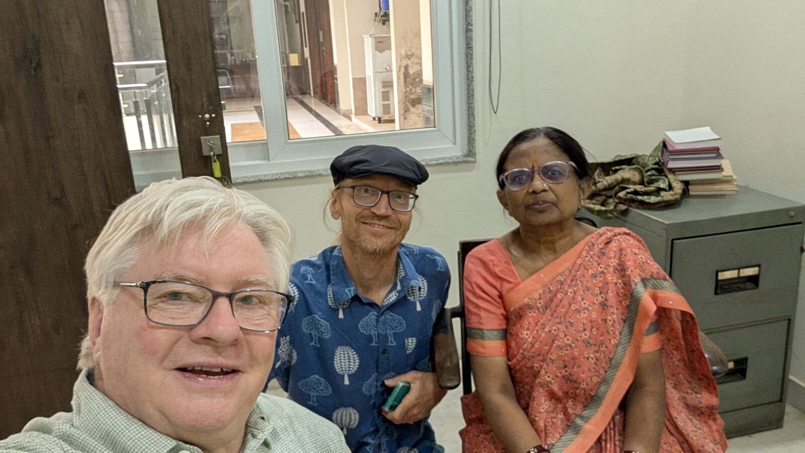 Dominik Wujastyk, Jason Birch and Shakuntala Jain seated in an office